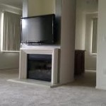 TV Mounted Above Fireplace